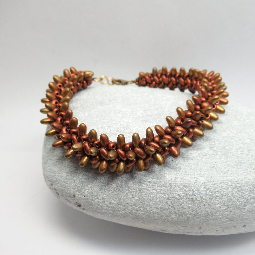 Spiky Copper tone herringbone woven bracelet